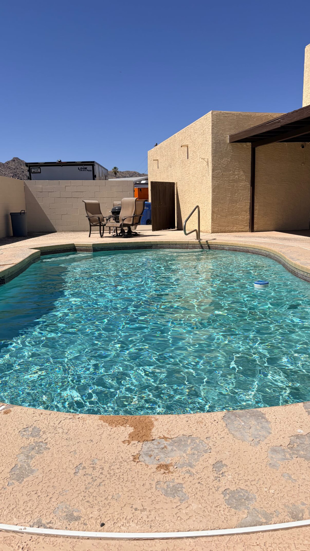 Crystal clear Phoenix backyard pool after weekly service