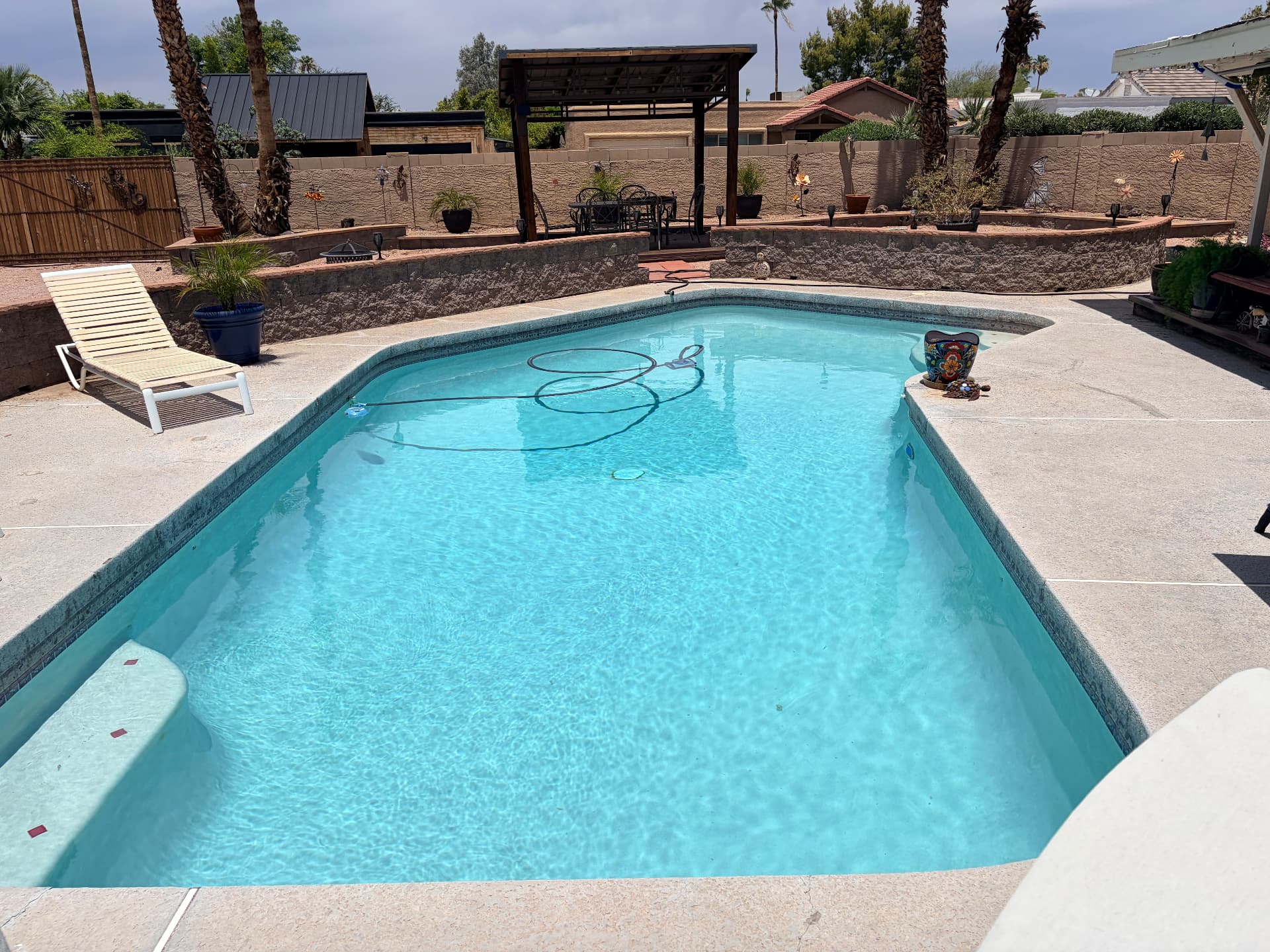 Clean rectangular pool with sparkling blue water